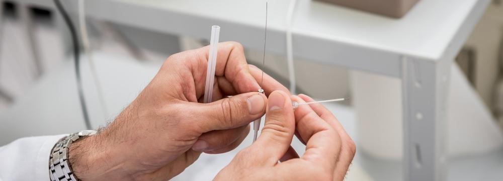 A doctor prepares cardiac catheter ablation in a doctors office